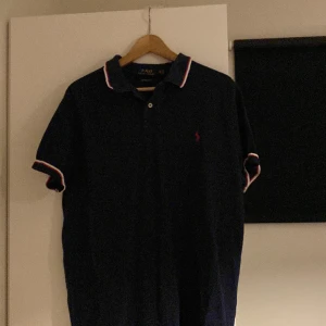 Tröja - Ralph lauren piké sitter som large/meduim 