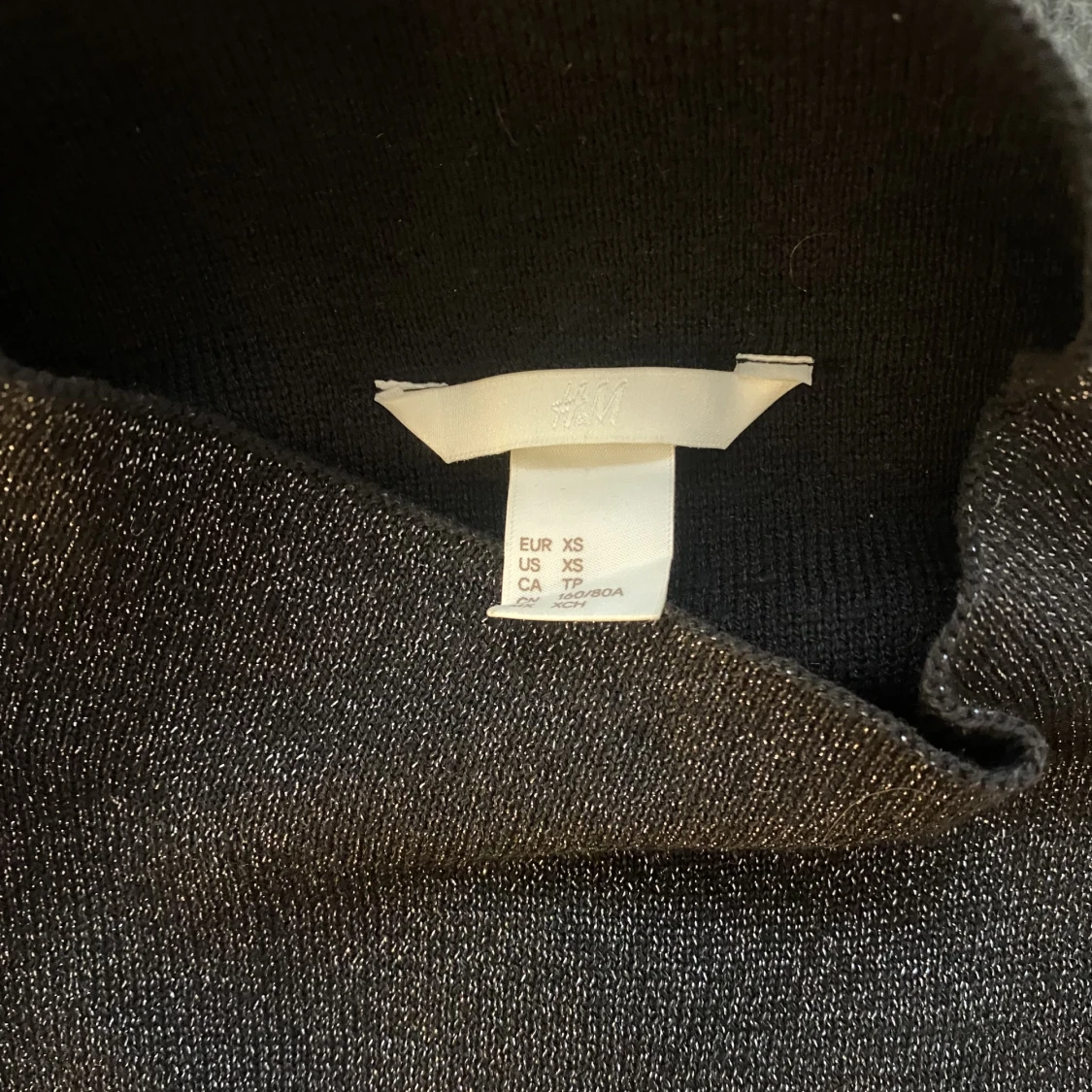 Glittrig stickad tröja - 91