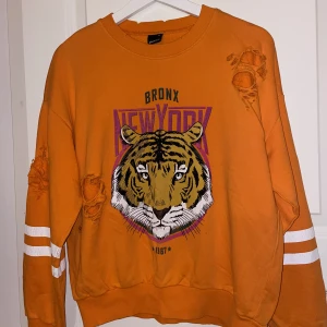 Orange sweatshirt - Gina Tricot