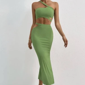 2-delat set - Grönt set med ”cutouts” sparsamt använt.