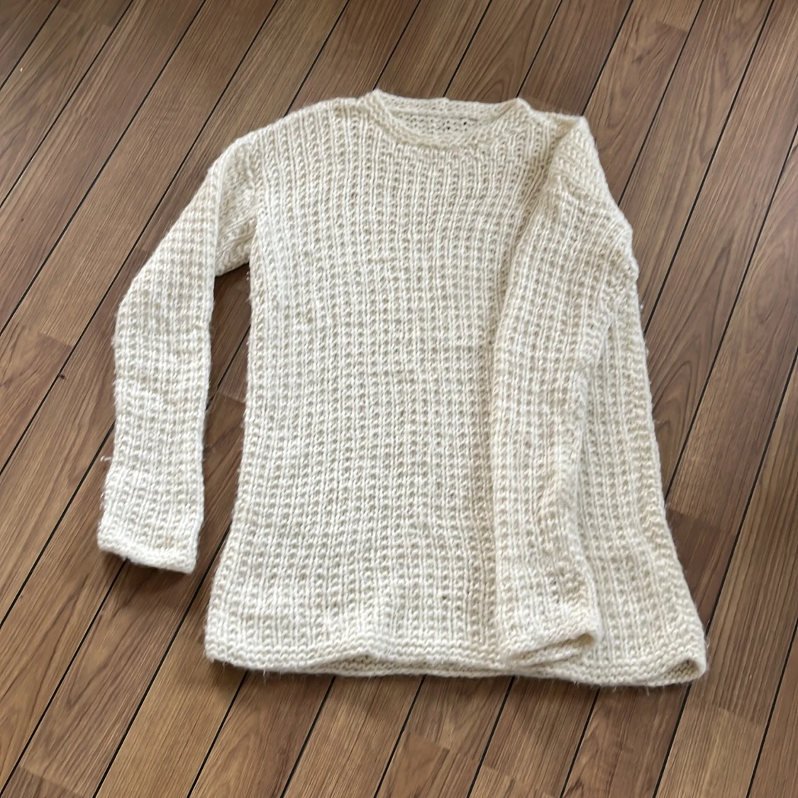 Hemstickad tröja