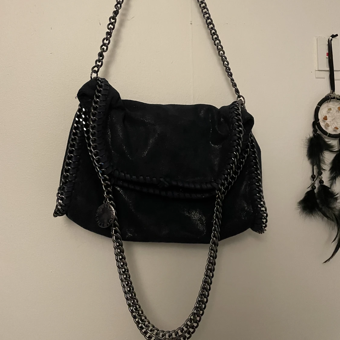 Mörkblå stella liknande väska