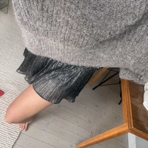 Mini glitterkjol - Supersnygg gliring kjol med inbyggda shorts 