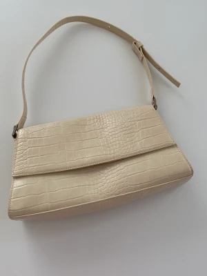 Handväska Monki - Handväska från Monki. Aldrig använd