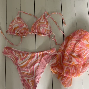 H&M Bikini with sarong - Never worn Hygiene strip still attached  Bikini set with sarong 