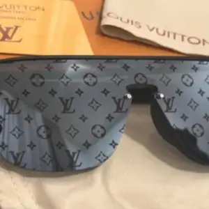 Solglasögon Louis Vuitton 