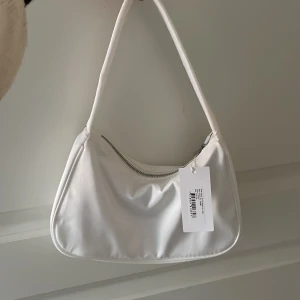 Väska - Handväska från Nelly, aldrig använd