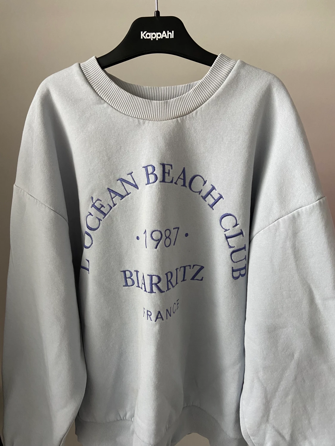 Blå sweatshirt