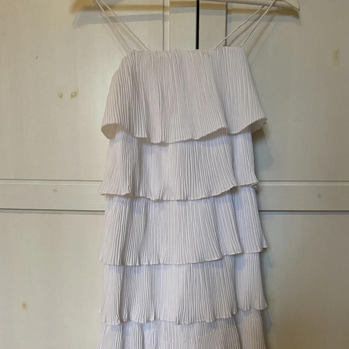 Plisserad klänning - 90