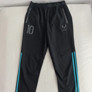 Adidas Messi Training Bottoms - Good condition, just has a few unnoticable marks. I used it for football training. 