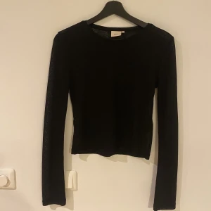 Sheer top Nelly - Aldrig använd. Är lite för liten. 