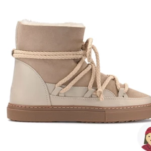 Inuikii skor - Säljer mina inukii skor då jag aldirg använder dessa! Nypris 2900kr!