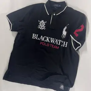 Designed to celebrate the BlackWatch Ralph Lauren Polo Team, this polo shirt is made from soft cotton mesh and features our signature embroidered Big Pony. XXL