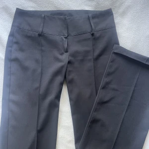 Lågmidjade kostymbyxor - Skitnsygga lågmidjade kostymbyxor i bra skick 