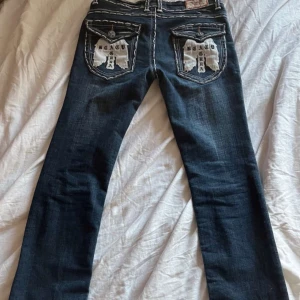Laguna Beach Jeans - Lågmidjade bootcut byxor i storlek S Midjemåttet: 78-82 och Innebärbenslängden: 89