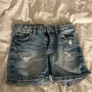 Lager 157  -  Shorts jeans, 140storlek 