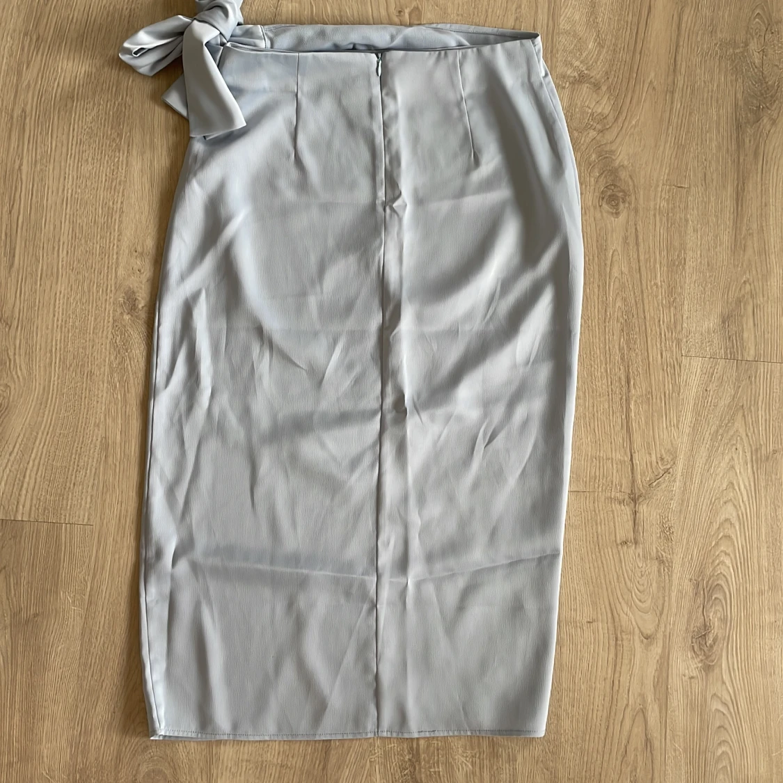 Ljusblå omlottkjol - 91