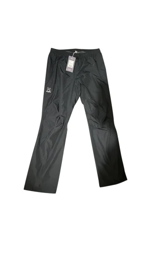Byxor från Haglöfs  - Husk är ett par vattentäta skalbyxor från Haglöfs. Dessa byxor är tillverkade i tvålagers PROOF™ECO-material i 100 % återvunnen polyester. Detta lätta material är slitstarkt mot revor. Nypris 1499 sek
