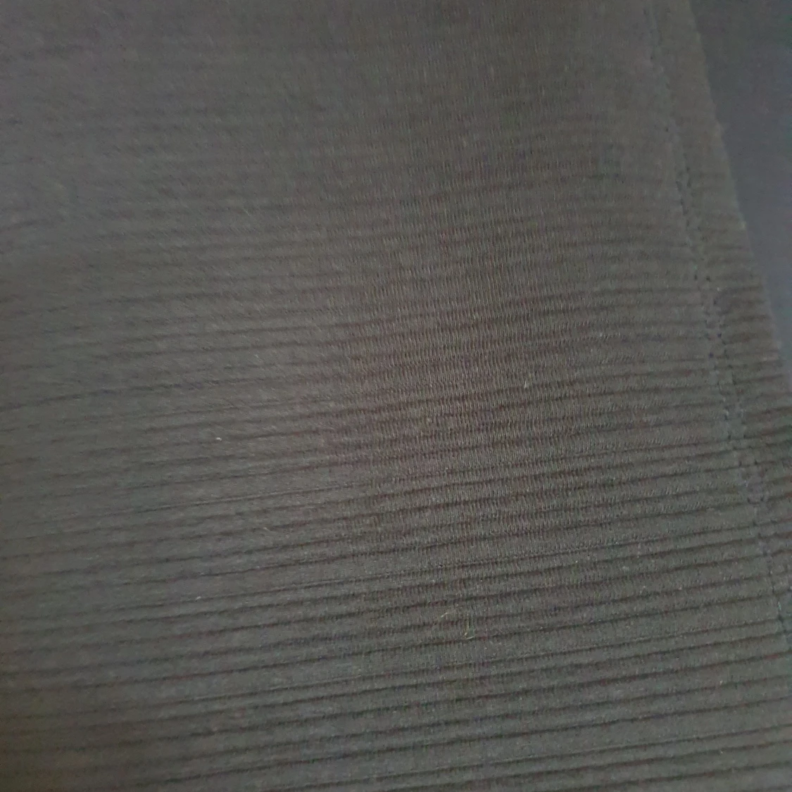 En längre kofta i fint skick.  - 90