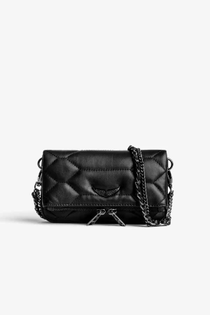 Zadig & Voltaire Rock Nano Quilted Leather Clutch  - Säljer denna svarta väska ifrån Zadig & Voltaire. En mindre modell i måtte 17,5 x 9 cm. Är i bra skick i material samt dragkedja mm. Nypris 4 000 kr och har kvitto. Kan skicka bilder vid intresse. 