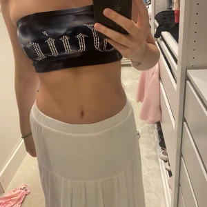 Bandeu från  juicy couture - Melerad blå topp från  juicy couture skön i sammet   Köparen står för frakt