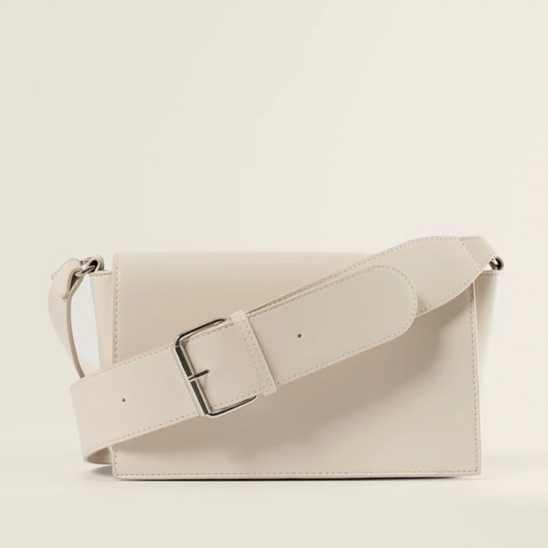 Beige crossbodyväska