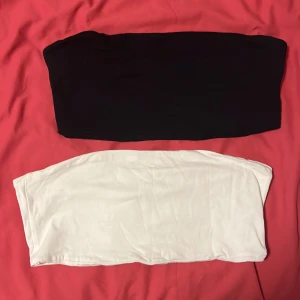 2-pack bandeau toppar/ 2 pack bandeau tops  - Good condition, 2 pack, one black and one white, comfortable Cotten. 