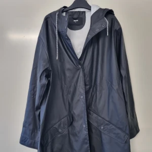 Regnjacka - Regnjacka, aldrig använd