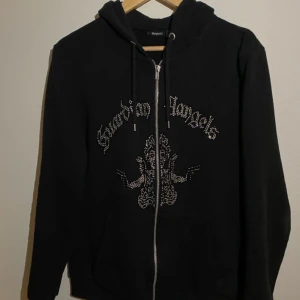 Rhinestone zip hoodie  - Rhinestone hoodie från blinglucid. Saknar några rhinestones men annars fint skick. Skick 8/10. Går även bra med byten.