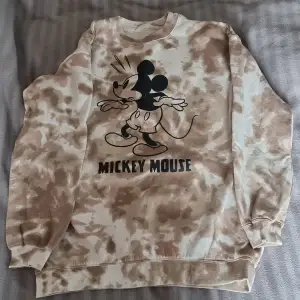 Mickey mouse tröja (Disney) i beige/brun.  EUR 170