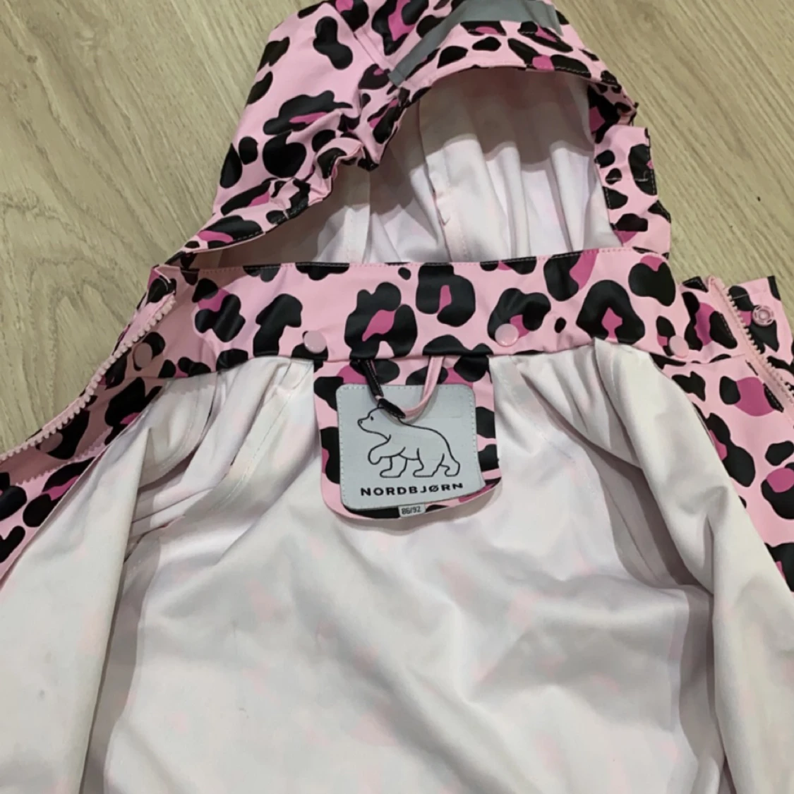 Regnjacka 86/92 oanvänd  - 91