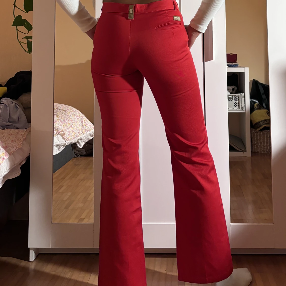 Röda lågmidjade byxor - 90