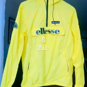Ellesse vindjacka  - Gul Ellesse jacka 