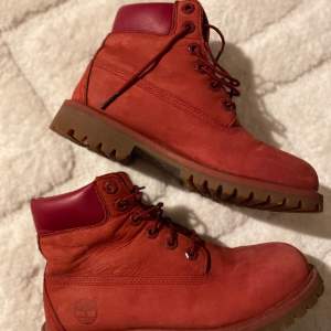 Good condition, timberland red. 