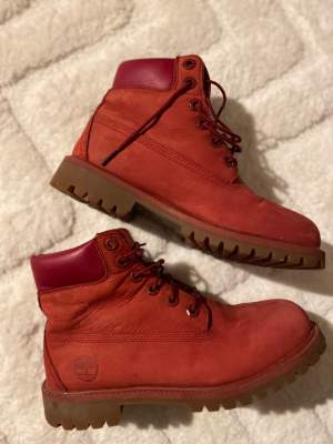 Good condition, timberland red. 