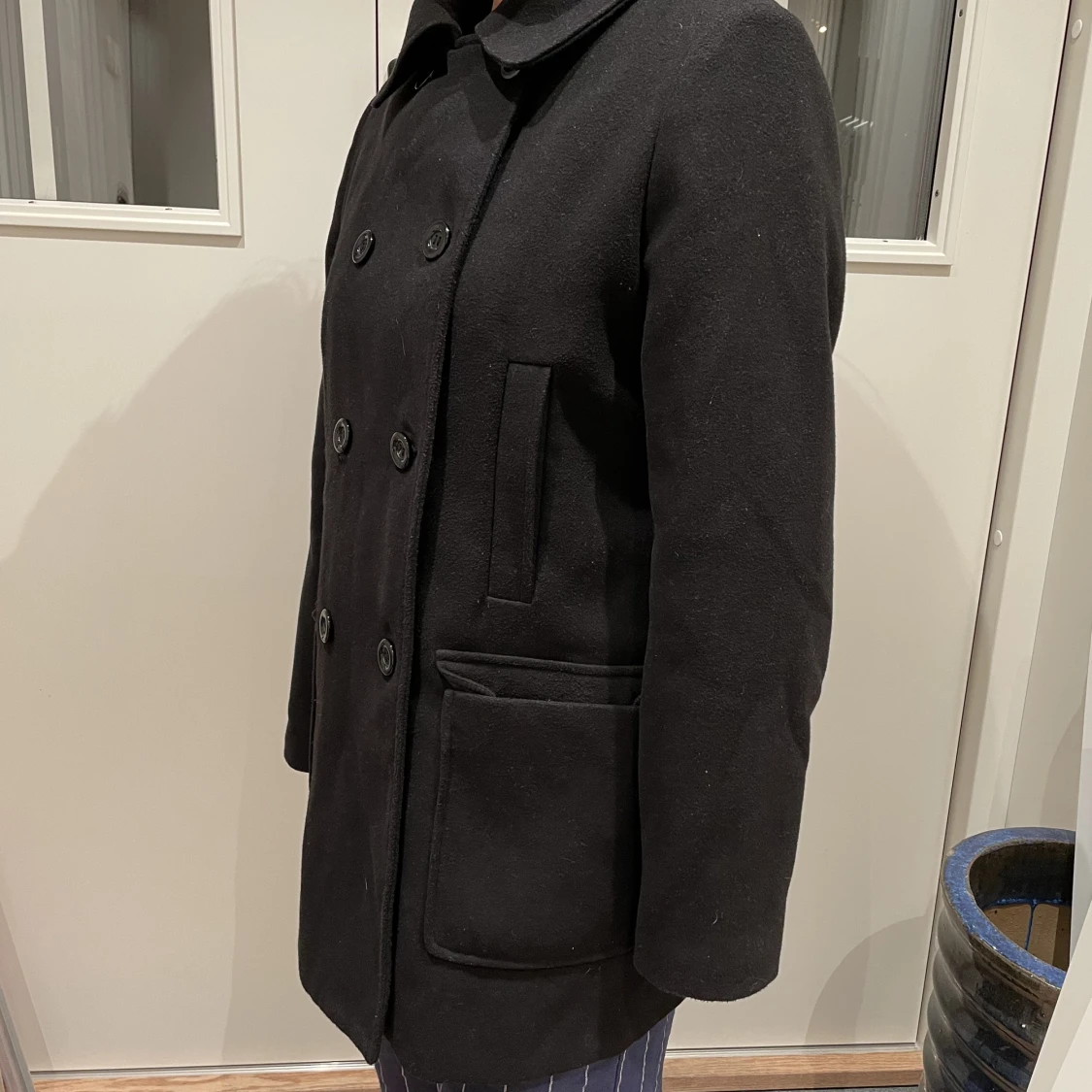 Svart, höstig kostymkappa