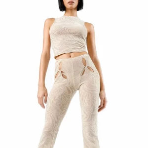 I AM GIA BYXOR OCH TOPP - Iamgia topp och byxa. Bikinin under ingår också. Endast använt en gång. Byxorna är i S och toppen i XS! 