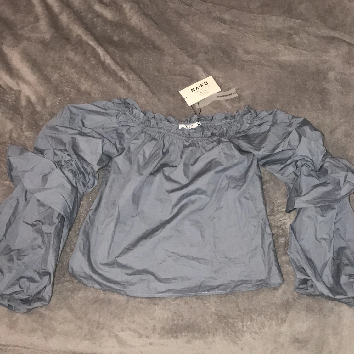 Blå off shoulder topp - 90