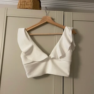 Vit partytopp  - Bra men använt skick. 