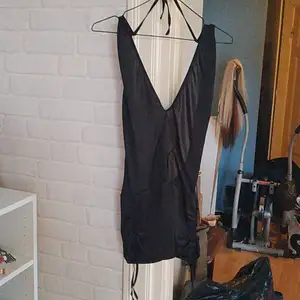 Sexig klänning från någon strippbutik inget speciellt märke, använd en gång (i foto sammanhang) 