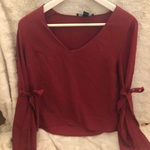 Topp - Fin topp som man kan knyta på armarna 