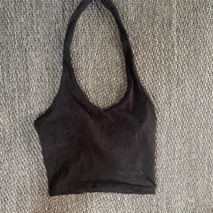 Topp - Halterneck topp från H&M. Aldrig använd.