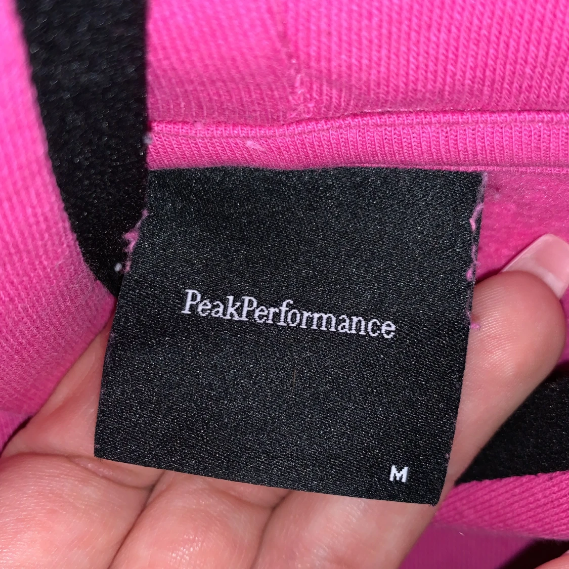 Rosa peak performance hoodie i storlek M - 90