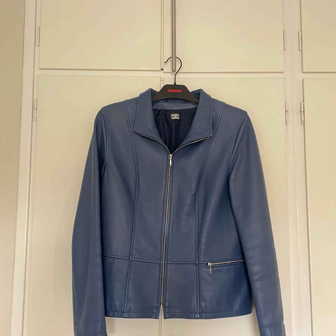 Blå vintage skinnjacka