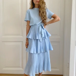 Ljusblå klänning från M-kae - Ljusblå klänning från M-kae.  Passar en 34 & 36a. Aldrig använd.  Ord pris 1277kr