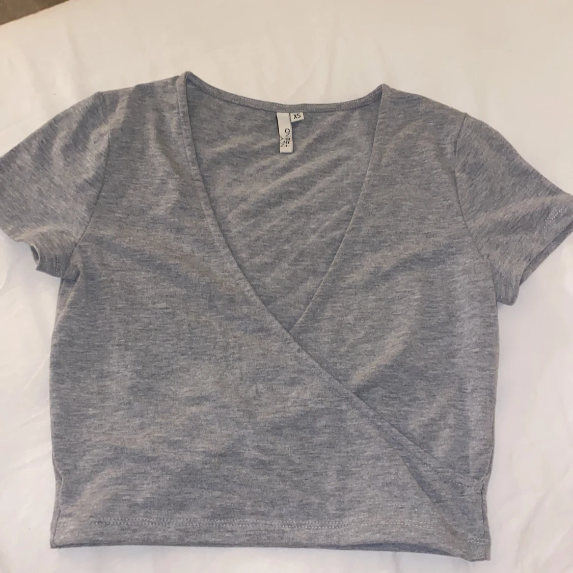 Grå topp från Nelly