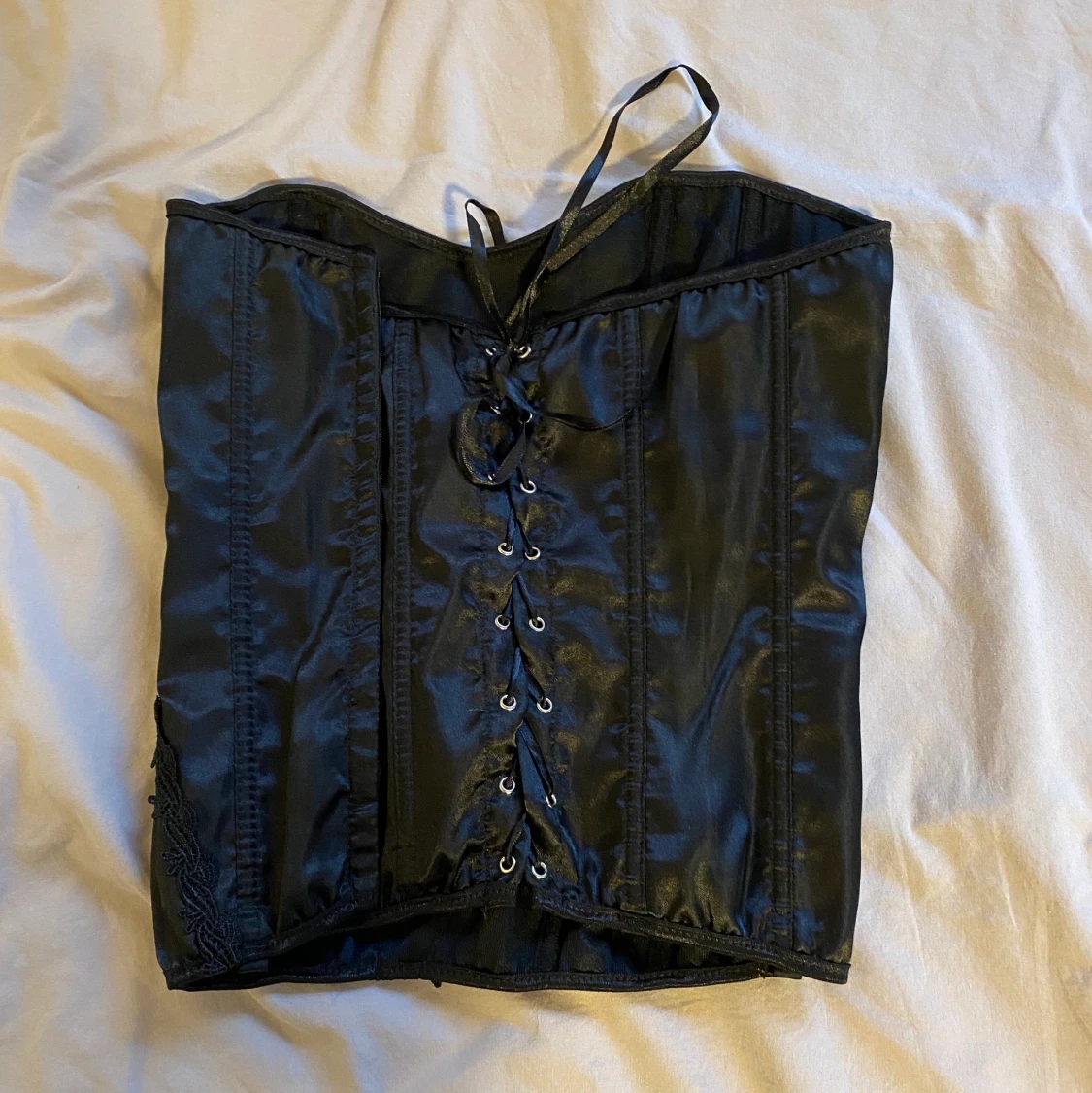 Svart korsett - 91