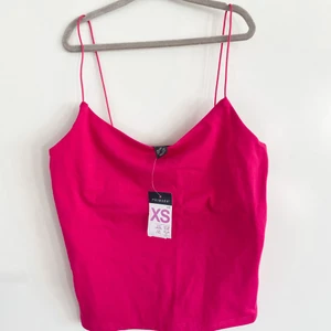 Linne XS NY - Magisk rosa färg, strl XS. Ny med lapp.  40kr + 26kr porto