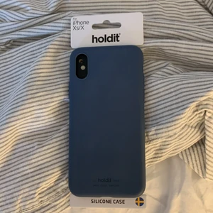 Blått holdit skal iPhone xs/x - Mörkblått skal från holdit till iPhone XS/X i nyskick.