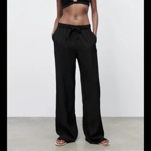 Svarta byxor - Strl S